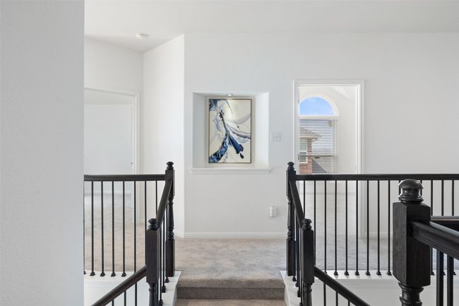 Stairs with carpet and baseboards | Image 23