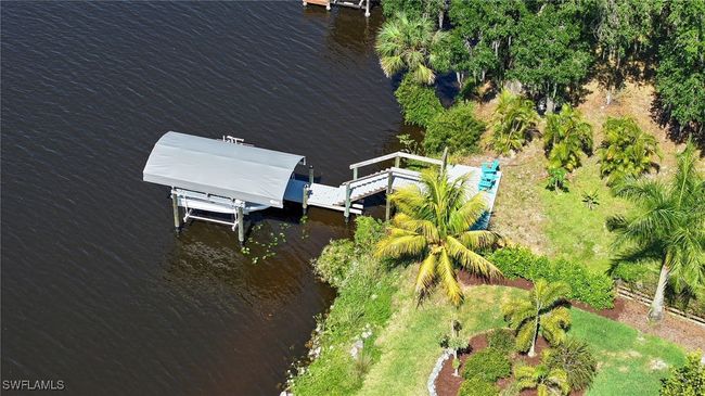 Aerial view featuring a water view | Image 4