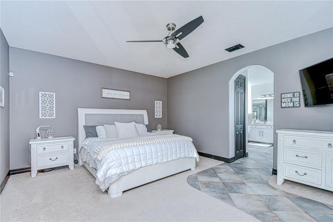 The primary suite is privately located on the first floor! | Image 15