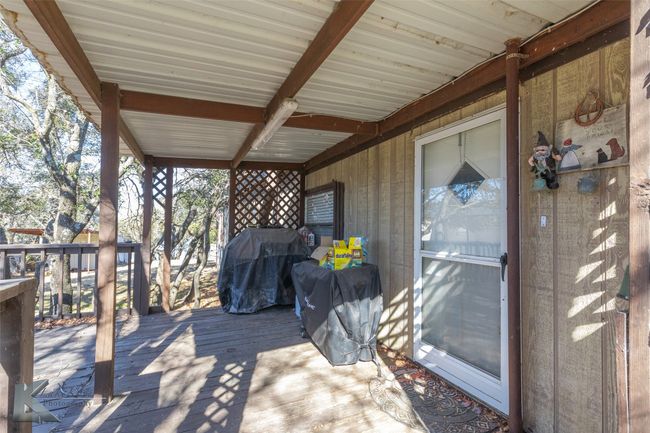Wooden deck with area for grilling | Image 7