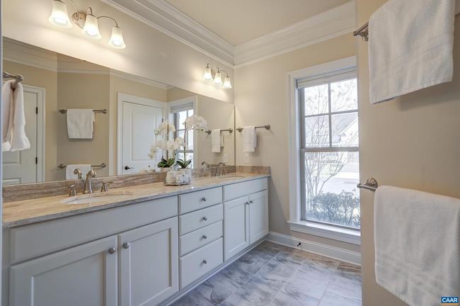 Primary bathroom with double sink vanity. | Image 28