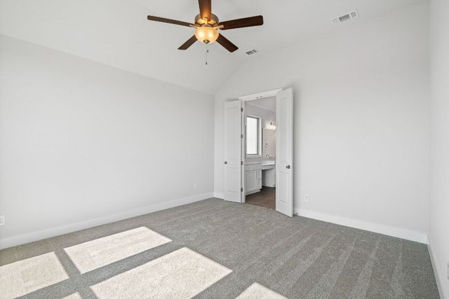 Primary Bedroom with elevated ceiling | Image 16