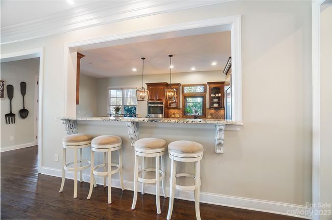Breakfast bar with plenty seating | Image 9