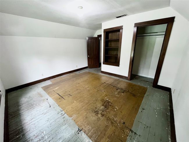 wood floors, vaulted ceiling, and a closet | Image 19