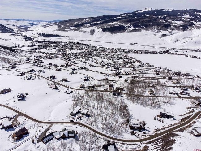 Snowy aerial view with a mountain view | Image 5