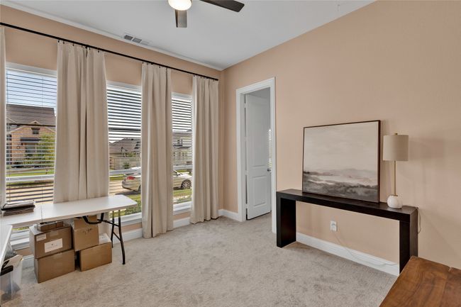 Unfurnished office with carpet flooring, ceiling fan, healthy amount of natural light, and baseboards | Image 5