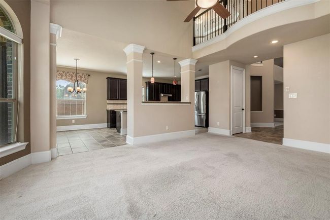 Family room open to kitchen. The extra counter space between the 2 rooms makes the perfect serving area when entertaining. | Image 13