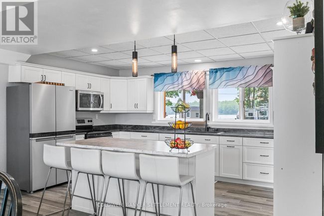 1021 Trillium Point Rd, House other with 4 bedrooms, 2 bathrooms and 6 parking in Sharbot Lake ON | Image 24