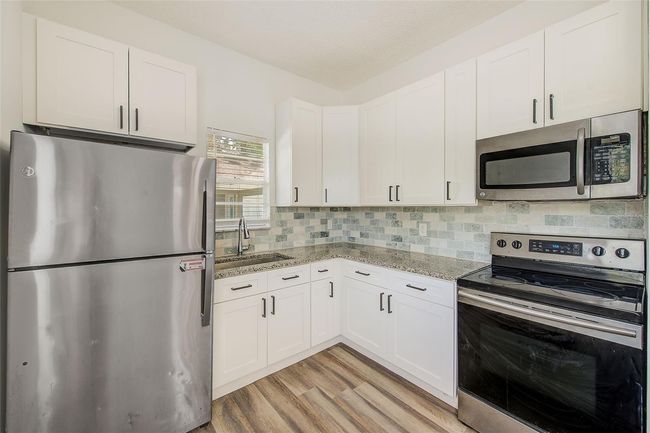8304 N 13 Th St, Home with 4 bedrooms, 2 bathrooms and null parking in TAMPA FL | Image 7