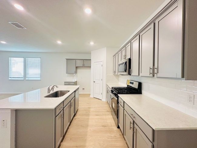 140 Corral Cv, House other with 4 bedrooms, 2 bathrooms and 2 parking in Kyle TX | Image 13