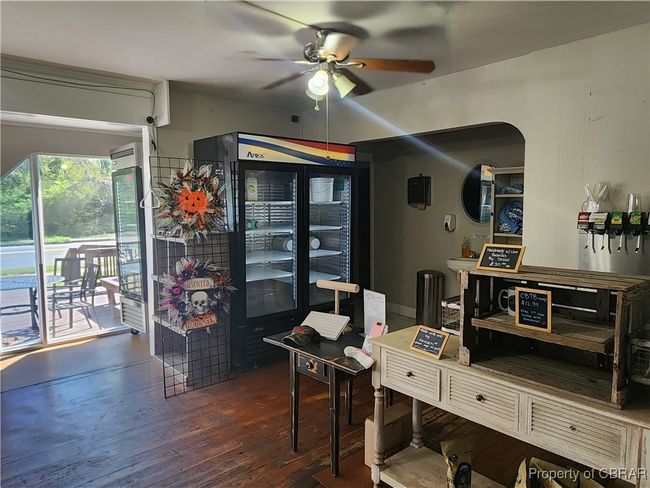 Main level entry with great natural lighting and adequate display space. | Image 10