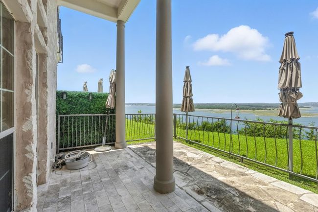 View of patio with a water view | Image 26