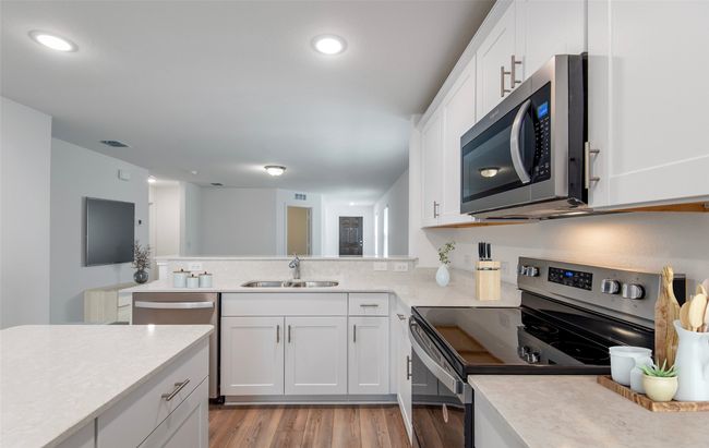 Abundant cabinet space in kitchen *Photos of furnished model. Not actual home. Representative of floor plan. Some options and features may vary | Image 7