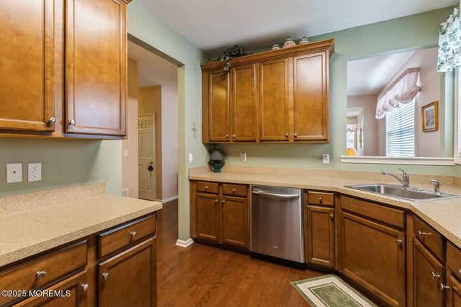 Tons of cabinet space in the sunny kitchen. | Image 8