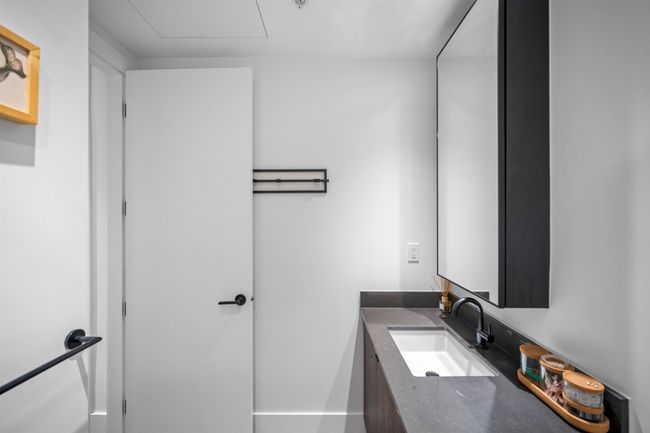 Bathroom featuring vanity | Image 12