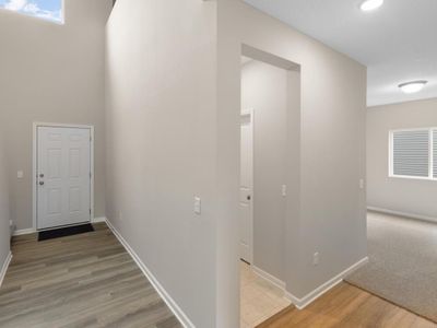 PHOTO OF A DIFFERENT HOME WITH SIMILAR PLAN & FINISHES. Foyer, Mudroom, & Flex Room. Photo may not depict actual plan, materials, & finishes. | Image 3