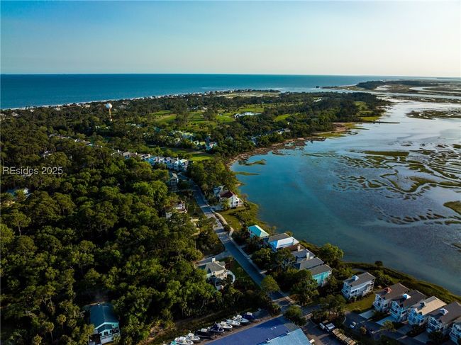 Drone view of beach and resort community of Fripp Island, Beaches of Fripp Island includes approx 3.5 miles of white sand beaches wi | Image 72