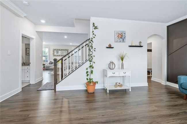 The Living Room Opens To The Family Room In The Background | Image 4