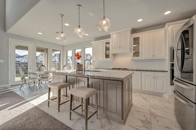 You'll never miss out on the fun while in the kitchen. | Image 12