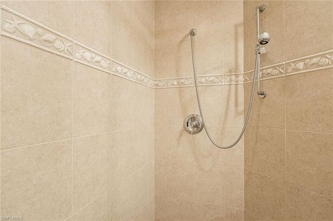 Interior details with a tile shower | Image 34