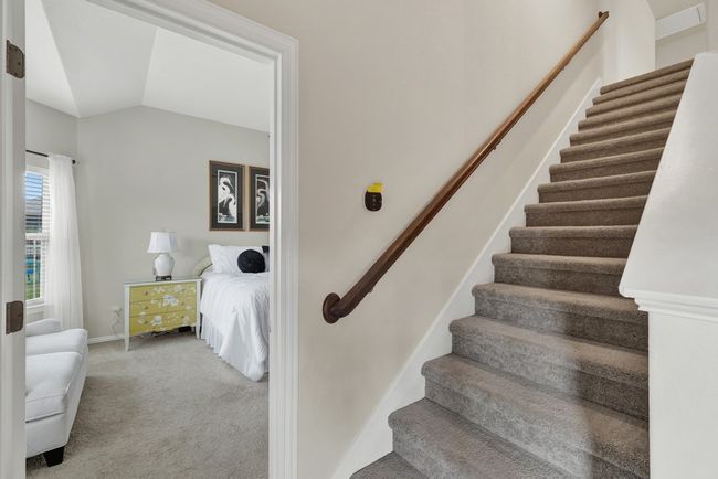 Staircase with baseboards, vaulted ceiling, and carpet floors | Image 24