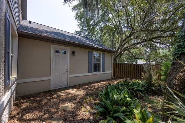 Backyard access from garage. | Image 31