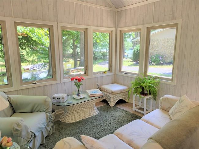 Sunroom does have a ceiling fan | Image 10