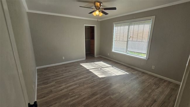 Primary bedroom with bathroom and large walk in closet. | Image 14
