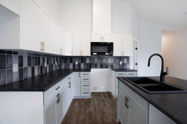 125 Upland Blvd, House other with 5 bedrooms, 3 bathrooms and 2 parking in Brooks AB | Image 6
