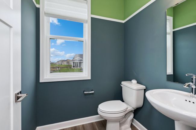 Photo is of the actual model. The main level powder bath. | Image 11