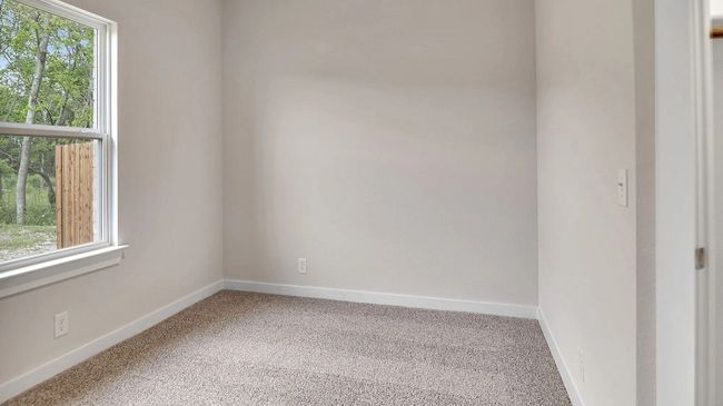 Carpeted spare room with baseboards | Image 20