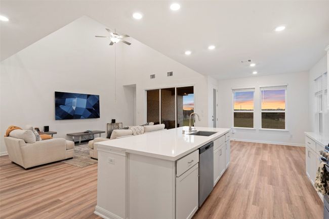 Open floor plan ; twilight photo | Image 4