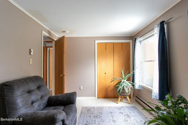 Office/bonus room with closet | Image 23