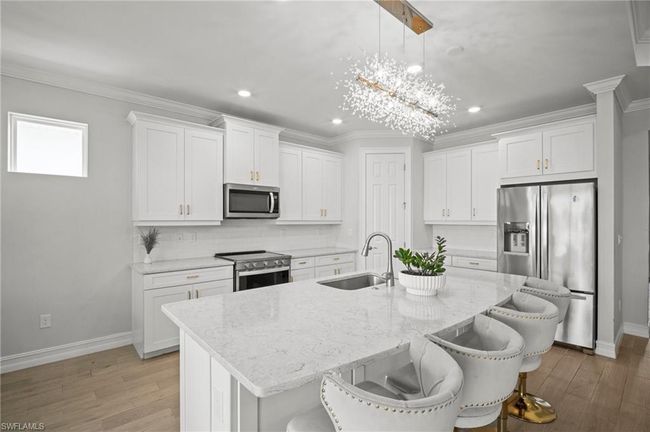 28041 Captiva Shell Loop, House other with 3 bedrooms, 4 bathrooms and 3 parking in BONITA SPRINGS FL | Image 6
