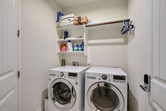 Laundry area with independent washer and dryer | Image 20