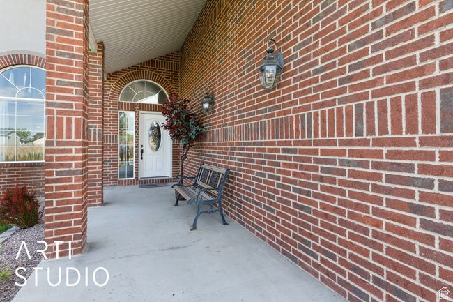 Property entrance with brick siding | Image 6