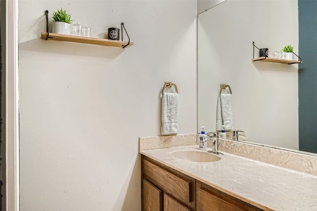 Bathroom featuring vanity | Image 12