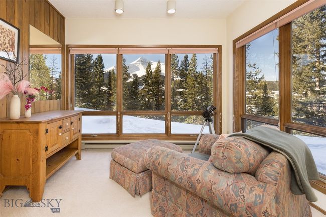 Sunroom / solarium with a baseboard radiator | Image 8