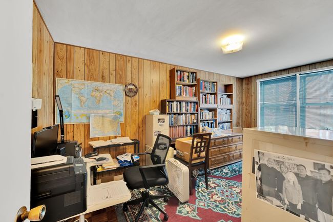 Home office with wooden walls | Image 11