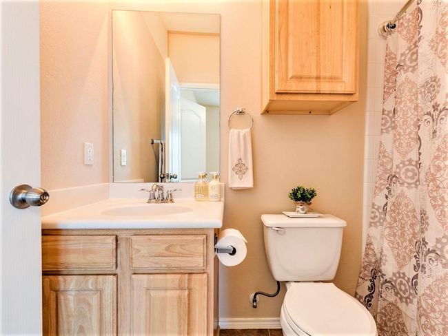 The primary ensuite bathroom comes with a shower/tub combo and single vanity. | Image 15