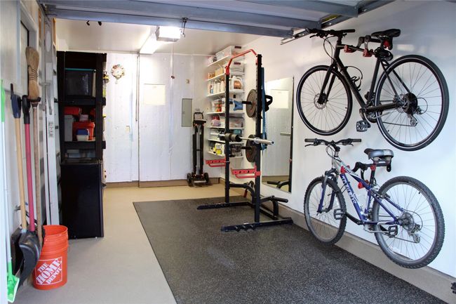 Workout area featuring a garage | Image 19