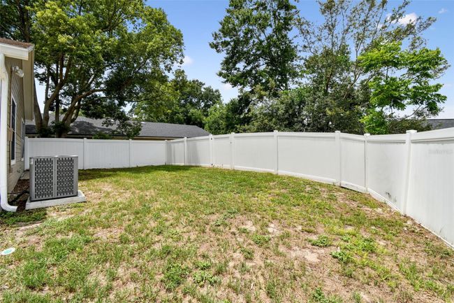 Fenced backyard | Image 49