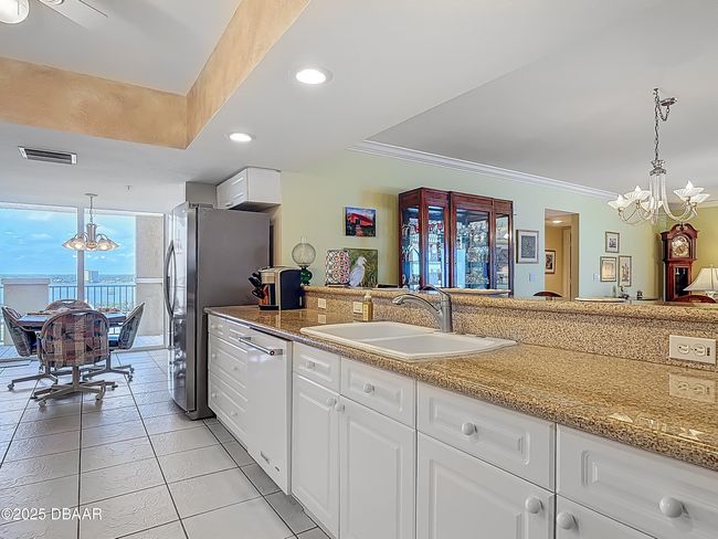 Kitchen with Riverview balcony | Image 7