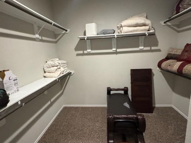 Primary bedroom walk-end closet | Image 11