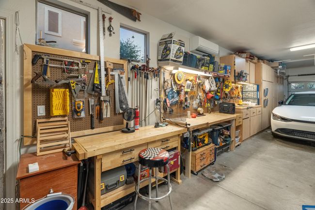 FULL WORK-SPACE WITH BUILT-IN CABINETS IN THE TANDEM GARAGE!!! | Image 67