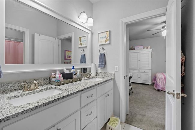 Jack and Jill bathroom with double sinks between bedroom 3 and 4. | Image 27