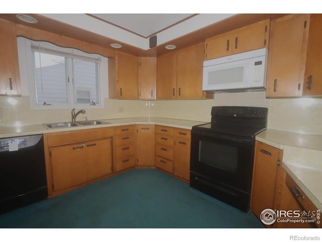 702 Diana St, House other with 3 bedrooms, 2 bathrooms and null parking in Fort Morgan CO | Image 4