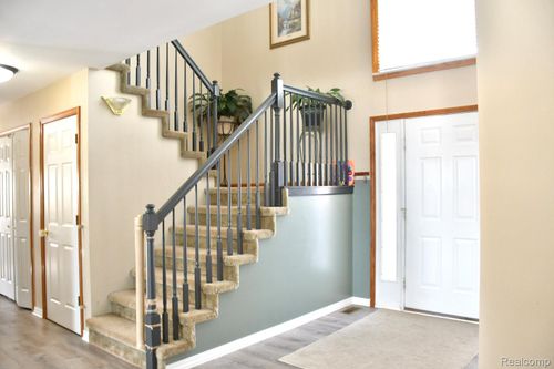 13993 Sturgeon Bar Ct, Gibraltar, MI, 48173-9580 | Card Image