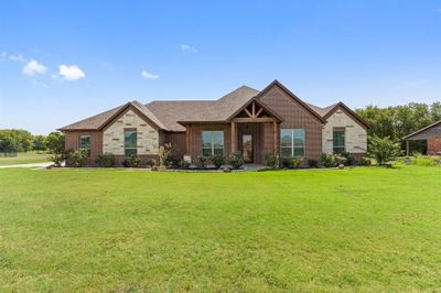 Craftsman-style house with a front yard | Image 2