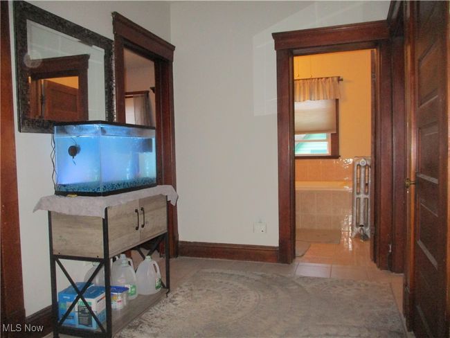 Center hall on 2nd floor leading to bedrooms and bath | Image 22